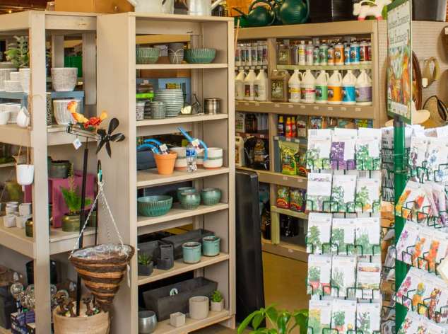 display of potted plants and tools